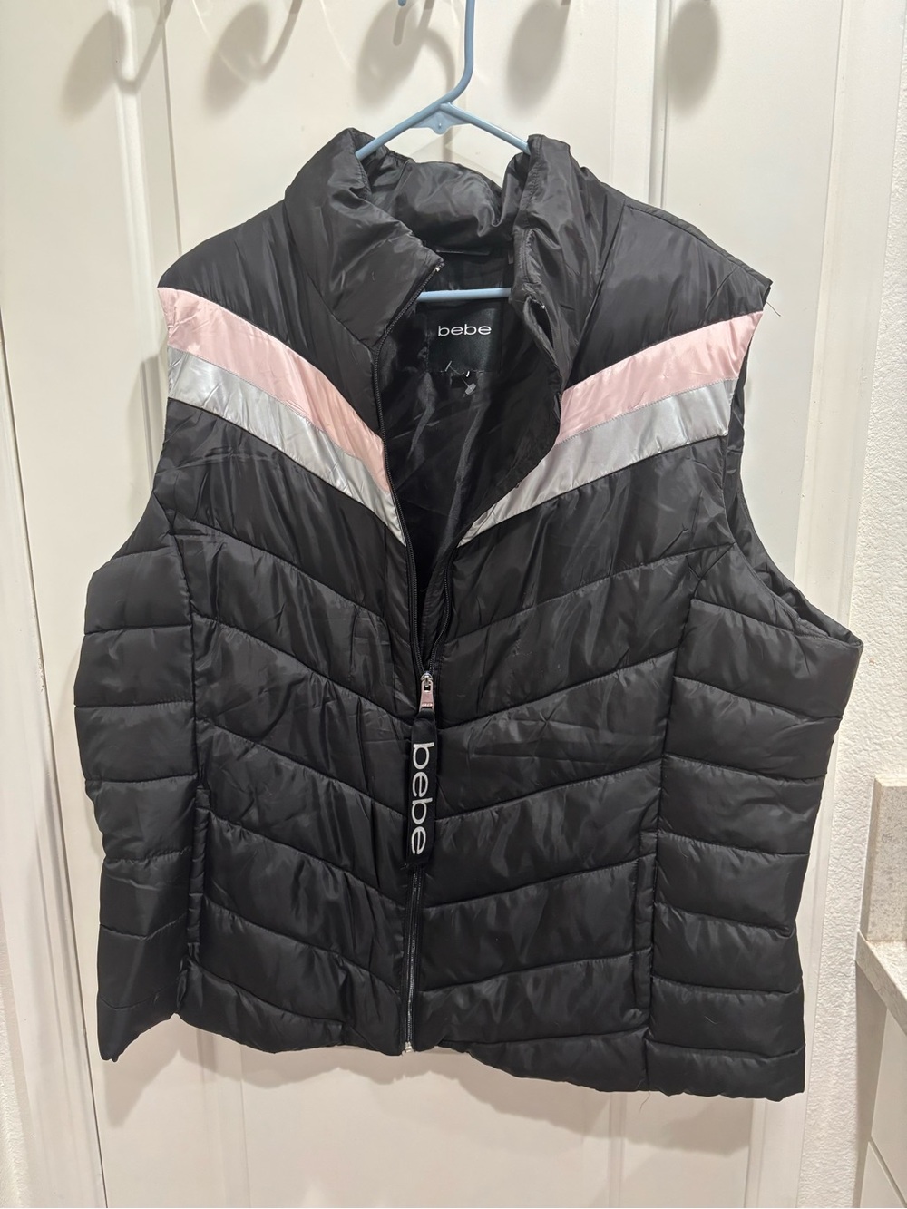 bebe Quilted Puffer Vest in Black with Pink & Silver Stripes